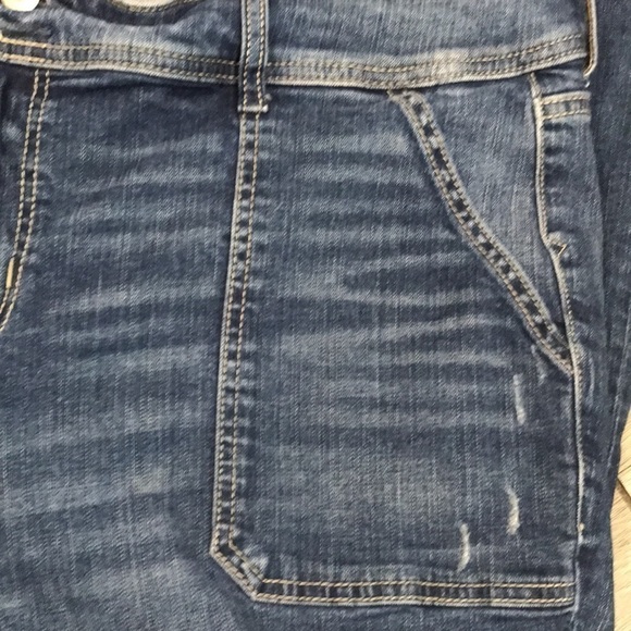 Torrid Mid-Rise Stretch Flare Leg Fray Hem Pork-chop Pocket Distressed Jeans - Picture 9 of 12